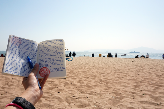 Journalling on the beach in China